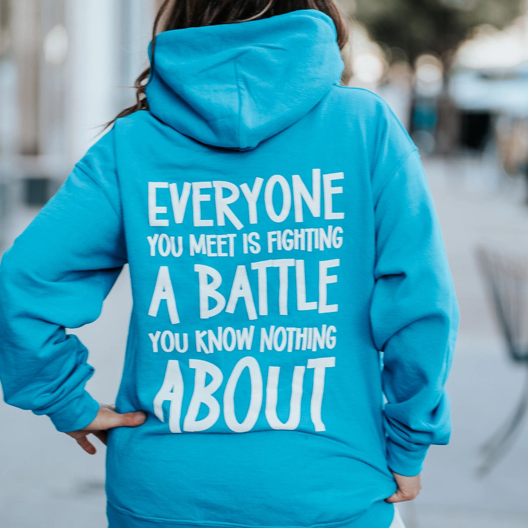 Be Kind blue hoodie. Back of hoodie. Everyone you meet is fighting a battle you know nothing about.