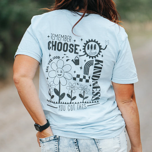 Remember choose kindness, see the good, you got this blue tshirt with black design with flowers, sunshine, and rainbow back for shirt with model wearing it