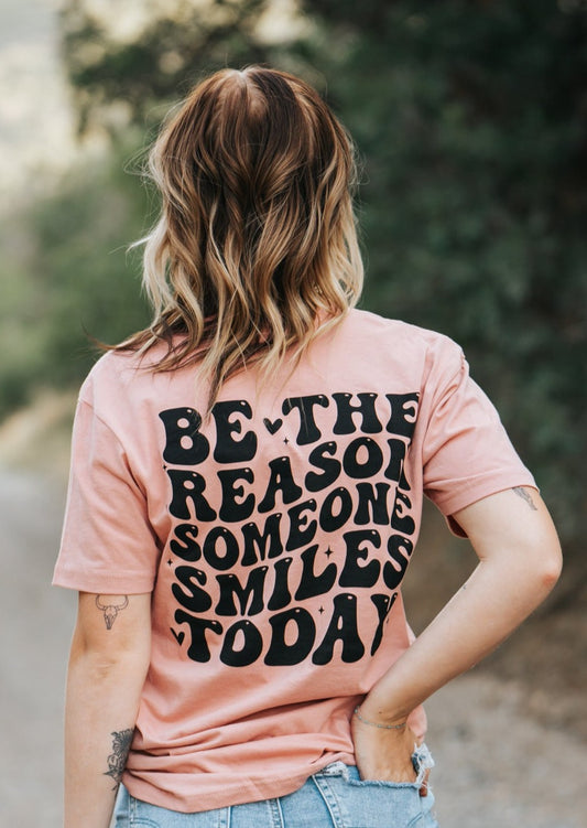 Be the reason someone smiles today back of shirt. pinkish tshirt