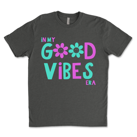 In my good vibe area gray t-shirt.  Blue and pink design with flower smiley face. 