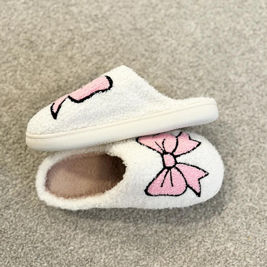 Pink bow slippers