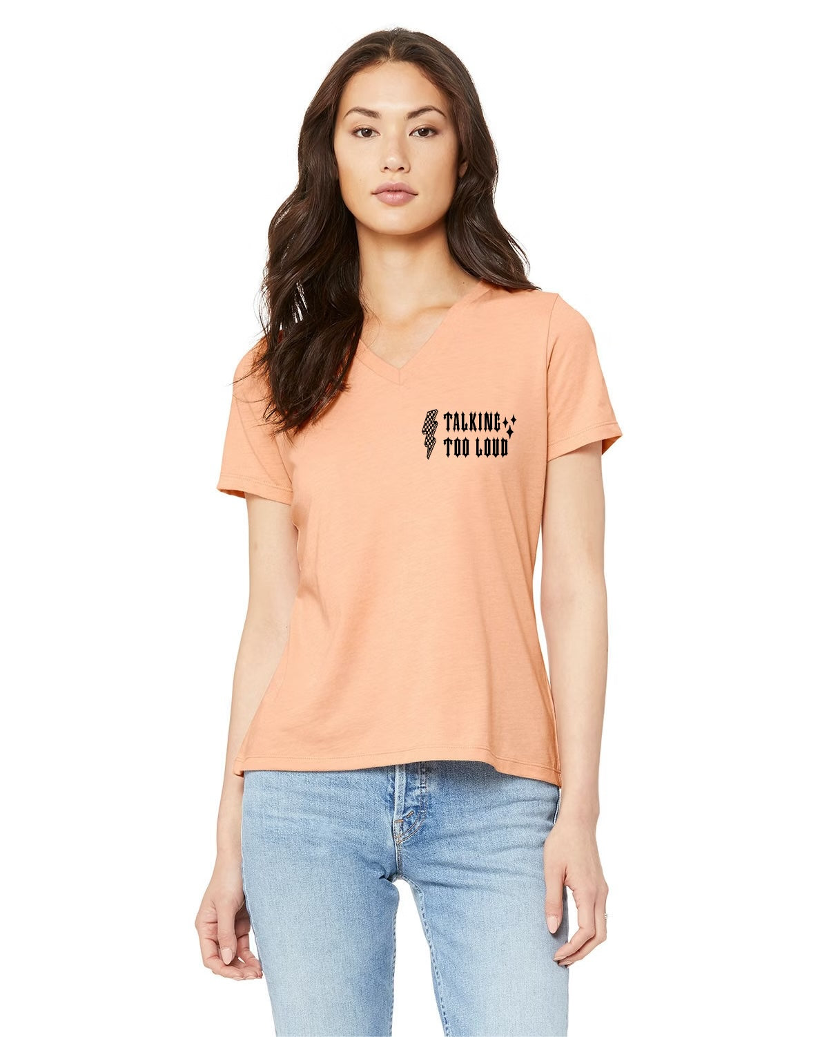 Front of peach shirt that says Talking too loud with sparkles and checkered lightning bulb.