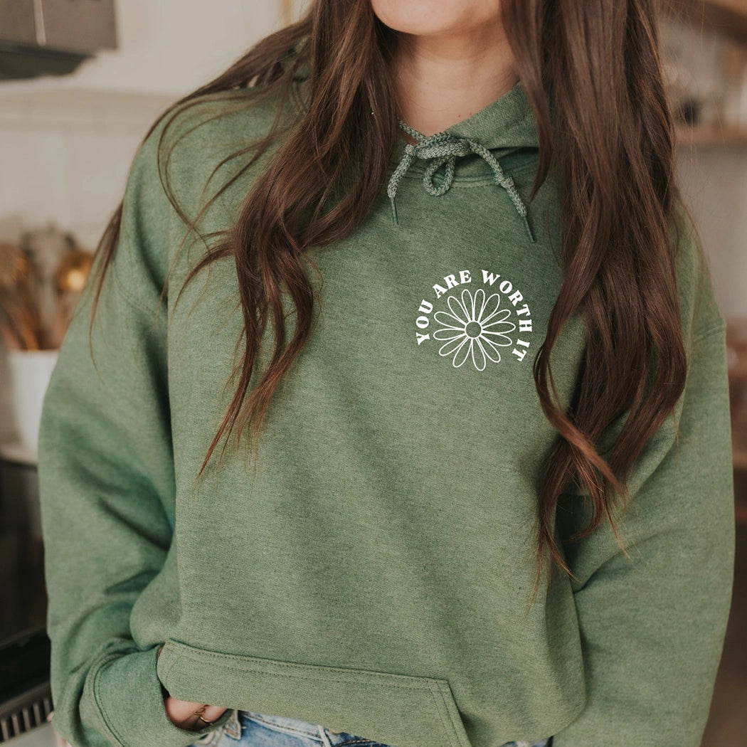 Don't forget give yourself time to grow. You are worth it. Positive message shirt. Black design on a green hoodie. Gildan hoodie. You are worth it with flower on front.