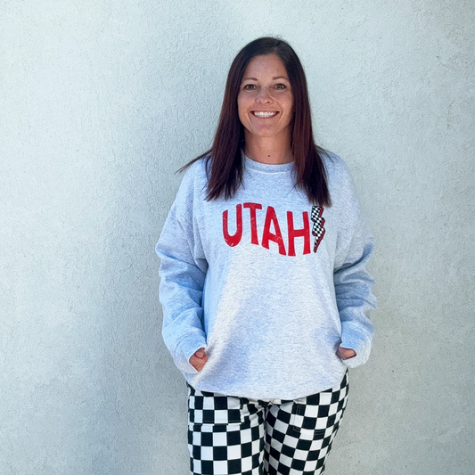 Gray sweatshirt with 'UTAH' and lightning bolt