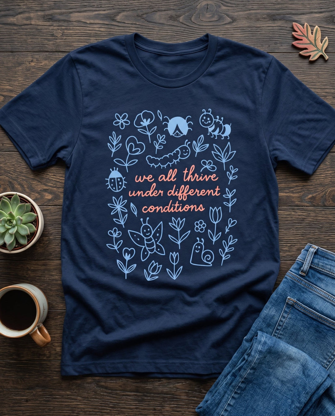We All Thrive Under Different Conditions Graphic Tee – Navy ADHD & Neurodiversity T-Shirt - Talking Too Loud Apparel